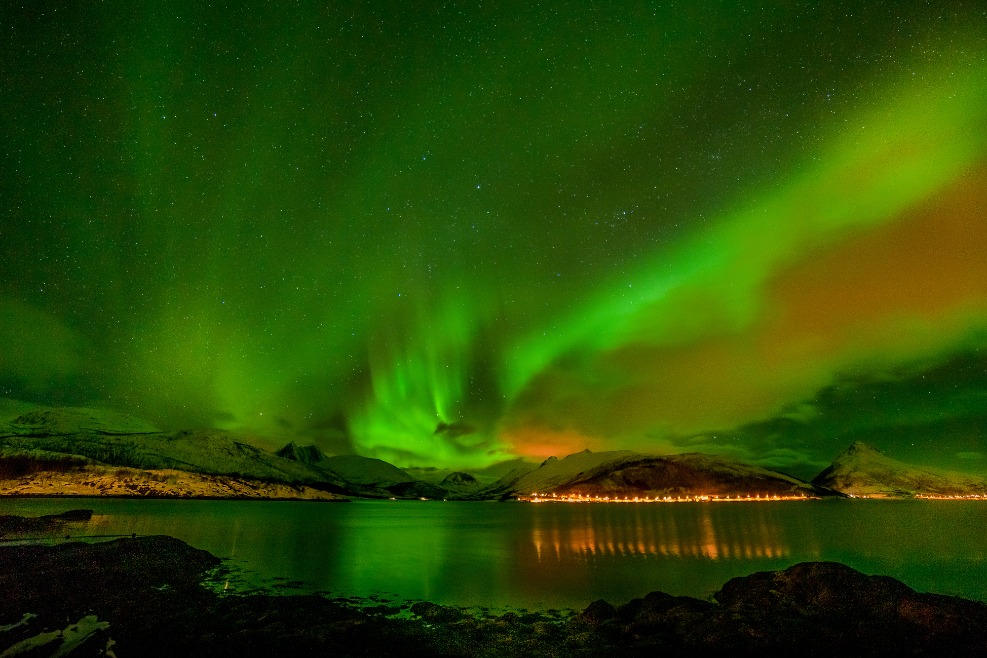 Dramatic polar lights, Aurora borealis over the mountains in the North of Europe Lofoten islands, Norway